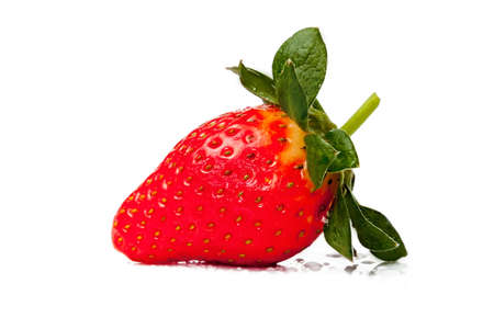 Red ripe strawberries isolated on white background with water dropletの写真素材