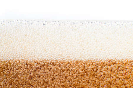 Macro bubble and foam on the glass wall of colaの写真素材