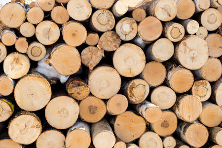 Pile of chopped fire wood prepared for winterの写真素材