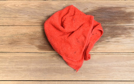 Red rags on the wooden floor.の写真素材