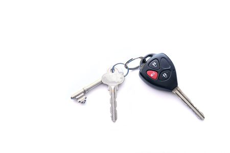Black Remote car and house silver keys isolated on white backgroundの写真素材