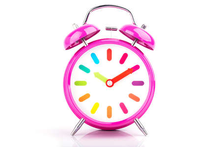 Pink retro Alarm clock isolated on white background