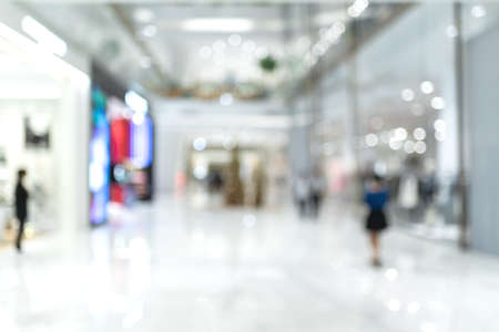 Abstract blur background : interior of Shops and people are shopping in department stores or shopping mall for background.の写真素材