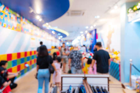 Abstract blur background : interior of Shops and people are shopping in department stores or shopping mall for background.の写真素材