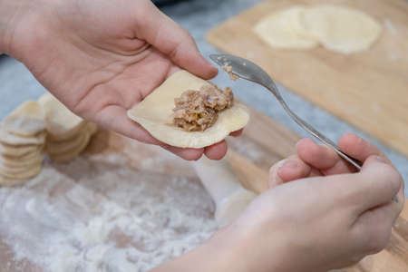 The preparation of dumplings with meat at home step by stepの写真素材
