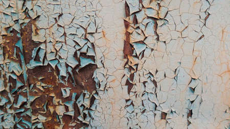 cracked paint on an old metallic surface, sheet of rusty metal with cracked and flaky paint, rusty...