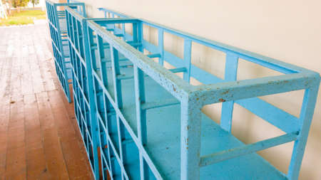 Old Shoe rack metal Shoe rack standing near the wall.の写真素材