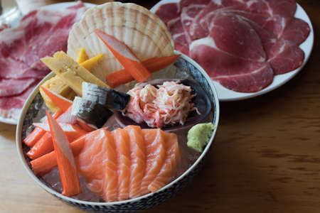 Crab Stick Salmon Sashimi Japanese Food Set and sweet egg and beef backgroundの写真素材