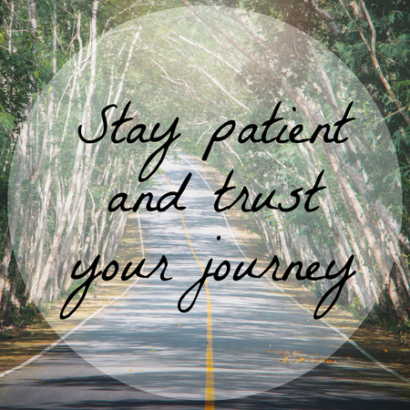 Inspirational quote on road and tree background with vintage filterの写真素材