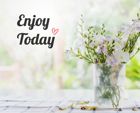 Inspirational quote on wild flowers background with vintage filter