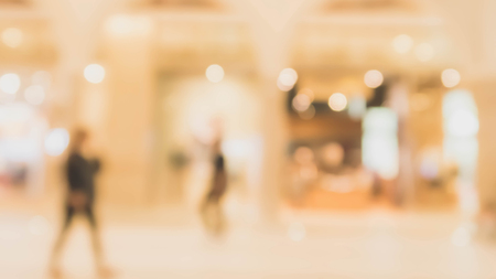 Abstract blur shopping mall and department store interior with people walking for background.の写真素材