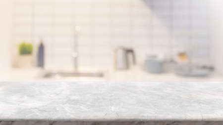 Empty white marble stone table top and blurred kitchen interior banner background - can used for display or montage your products.の写真素材