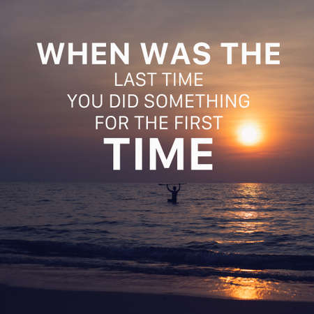 Inspirational and motivation quote on traveler man playing paddle board in the sea with sunset sky background.の写真素材