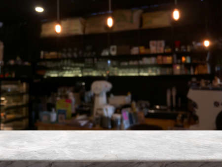 Empty white marble stone table top and blur glass window interior restaurant banner mock up abstract background - can used for display or montage your products.の写真素材