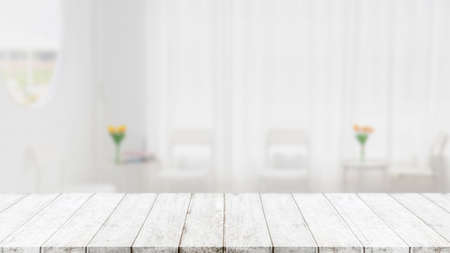 Empty wood table top and blurred coffee shop and restaurant interior background - can used for...