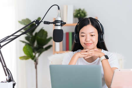 Asian woman student or businesswoman remote working from home with computer.Concept of social...