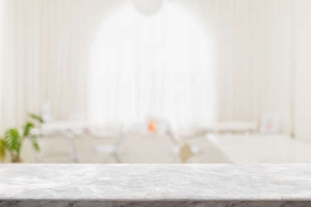 Empty white marble stone table top and blur glass window interior restaurant banner mock up abstract...