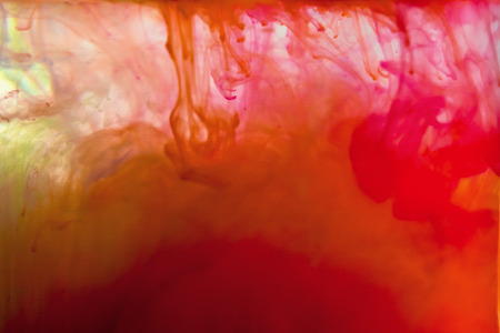 Colorful ink swirling in water