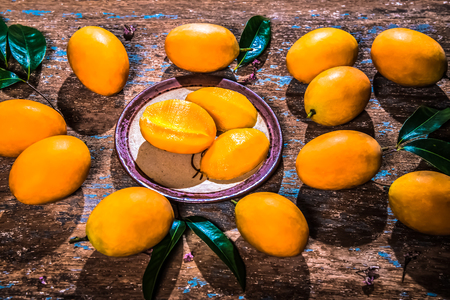 Marian plum on wooden plate