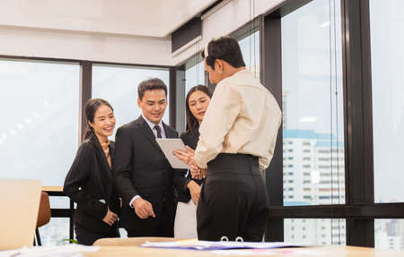 Success and Teamwork concept, Group of young business people meeting in officeの写真素材