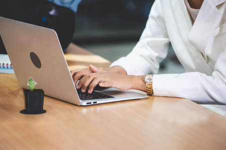 Young businesswoman using laptop lcomputer