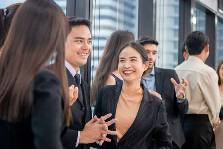 Success and Teamwork concept, Group of young business people chatting after the meetingの写真素材