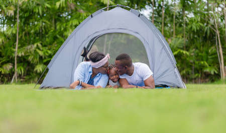 Cheerful african american family enjoying in the park, Happiness family conceptsの写真素材