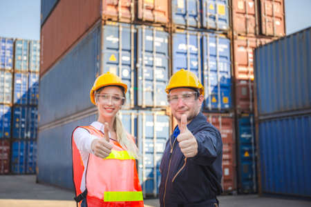 Success Teamwork Concept, Business people engineer and worker team smiling with giving thumbs up as sign of Successの写真素材
