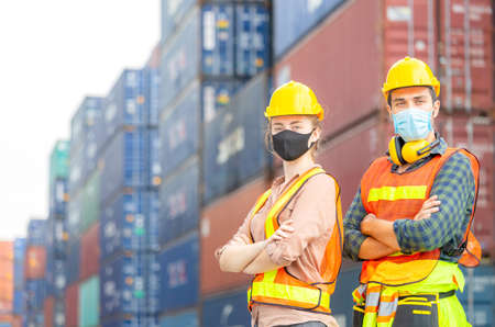 Success Teamwork Concept, Business people engineer and worker team wearing protection face mask...