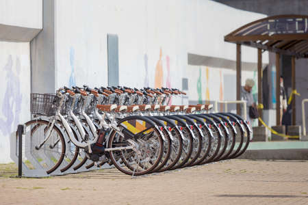Osaka, Japan - Apr 16, 2019 : Group of japan public travel bikes for tourists interested in borrowing to ride of in Osaka, Japanの写真素材