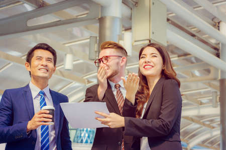 Success Business man and businesswomen present project to client with happiness and joyful working, Happiness Team Conceptの写真素材