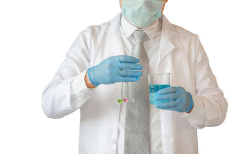 Scientist holding test tubes examining beaker with clipping path on white backgroundの写真素材