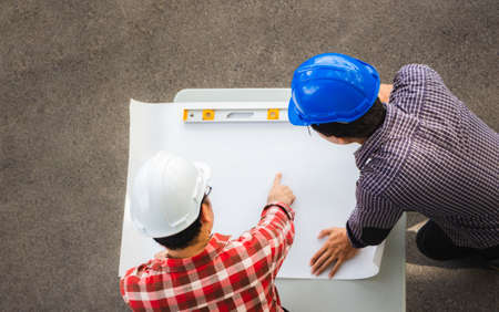Team of Architect engineer planning group project partners meeting at building site, Construction site office teamwork conceptの写真素材