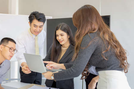 Group of Business people team meeting working on laptop in officeの写真素材