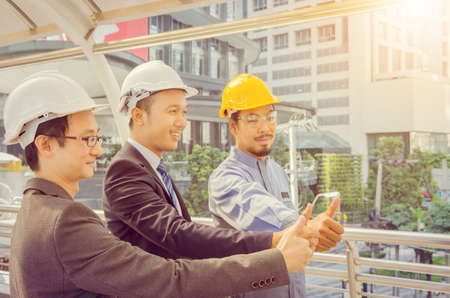 Team giving thumb up as sign of Success Business Teamwork Concept.の写真素材