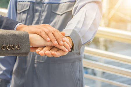 Team giving thumb up as sign of Success Business Teamwork Concept.の写真素材
