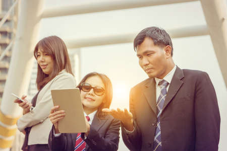 Group of Business people in a meeting discussing ideas, working outside office concept.の写真素材