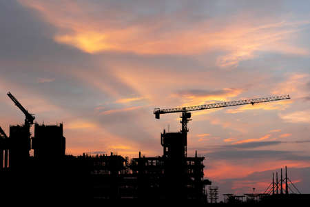 Silhouette of Engineer and worker on building site, construction site with clipping path on white background for conceptsの写真素材