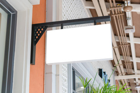 Outdoor business sign mock-up poster display store front, Advertising banners mockup outside a shopの写真素材
