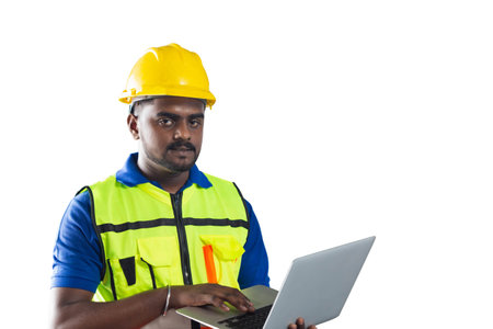 Man in hard hat with clipping path on white background, Worker man with laptopの写真素材