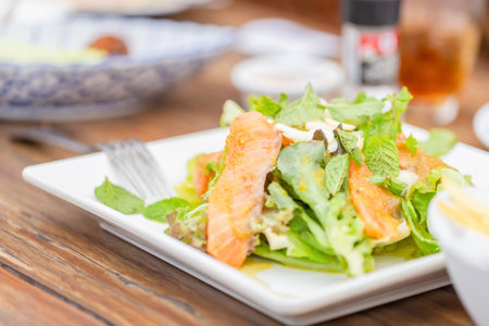 Fresh salmon salad with green vegetablesの写真素材