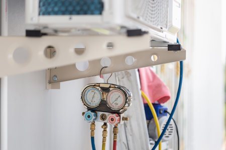 Manifold tool gauge HVAC Air Conditioning, Air conditioner compressor unit, Air conditioning repairing and maintenance conceptsの写真素材