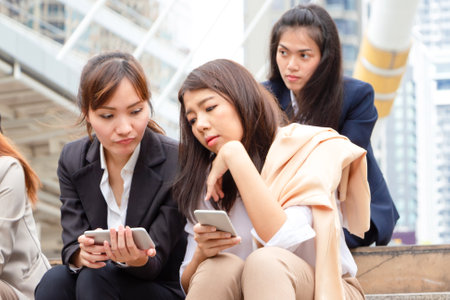 Business woman team meeting and sharing ideas, Young Asian business team discussing in the morning, Women's Day Conceptsの写真素材