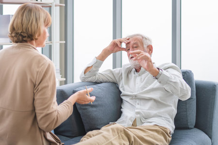 Senior man consulting with psychologist , Old patient counseling mental with doctor woman at clinicの写真素材