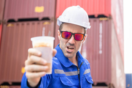 Caucasian engineer at shipping yard
