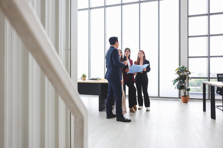 Business Team Meeting in Office, Asian Team Collaboration in Modern Office Meeting, Startup Team Planning Project During Office Meetingの写真素材