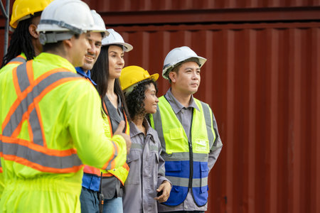 Diverse Team of Construction Workers and Engineers at a Job Site, Group of Multi Ethnic Industrial...