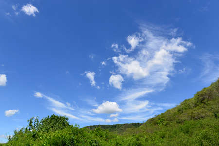 Hill and Blue sky with clouds in rural areas, Thailandの写真素材