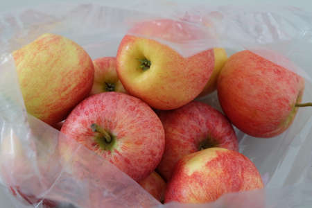 Red Apple lots of In plastic bagの写真素材