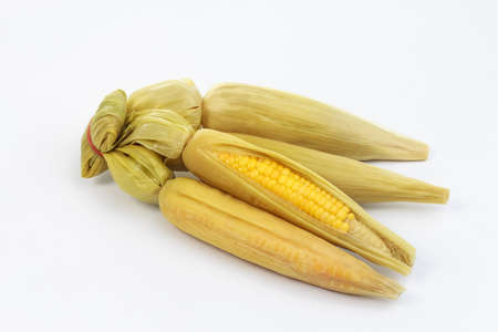 boiled corn isolated on white backgroundの写真素材